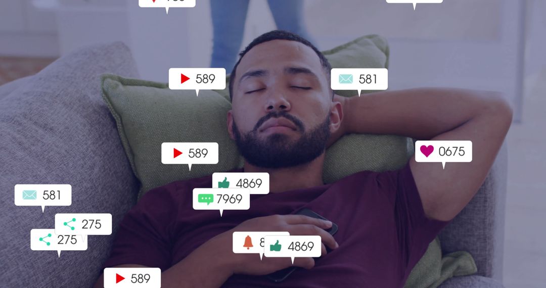 Relaxed Man Receiving Multiple Digital Notifications at Home