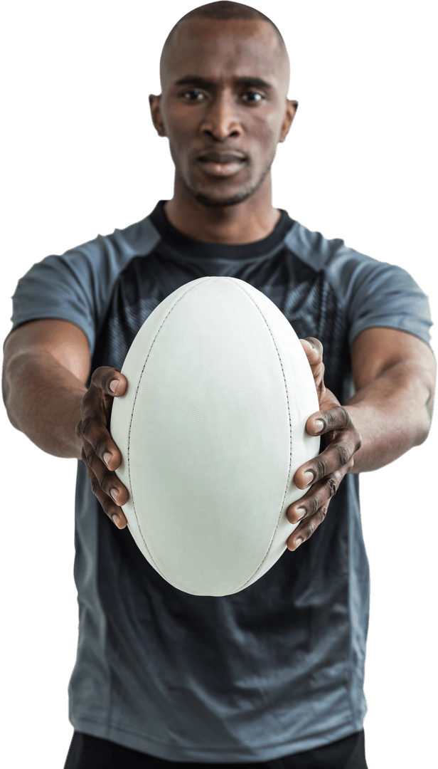 Confident Male Athlete Holding Rugby Ball on Transparent Background
