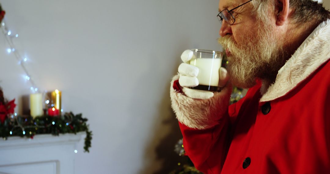 Santa Claus Drinking Milk Near Christmas Tree - Free Images, Stock Photos and Pictures on Pikwizard.com