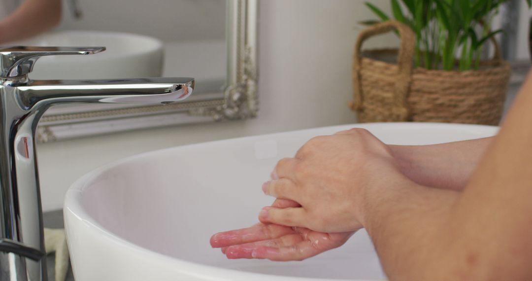 Close-Up of Biracial Woman Washing Hands in Bathroom for Beauty and Health Concept - Free Images, Stock Photos and Pictures on Pikwizard.com