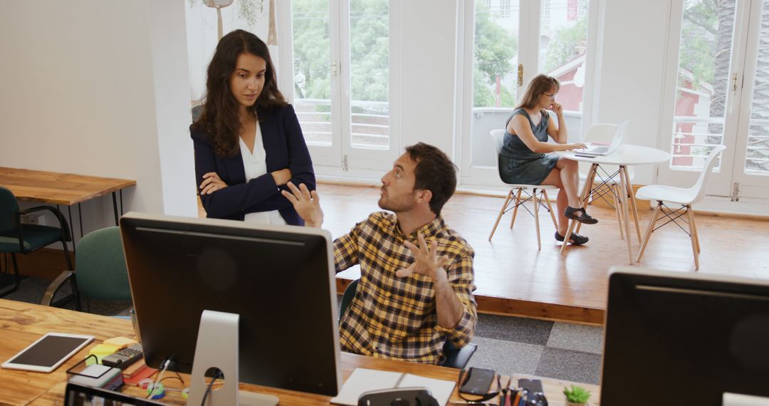 Young Office Professional Discussing Project Ideas