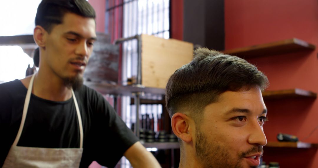 Barber Trimming Hair of Client in Modern Barbershop - Free Images, Stock Photos and Pictures on Pikwizard.com