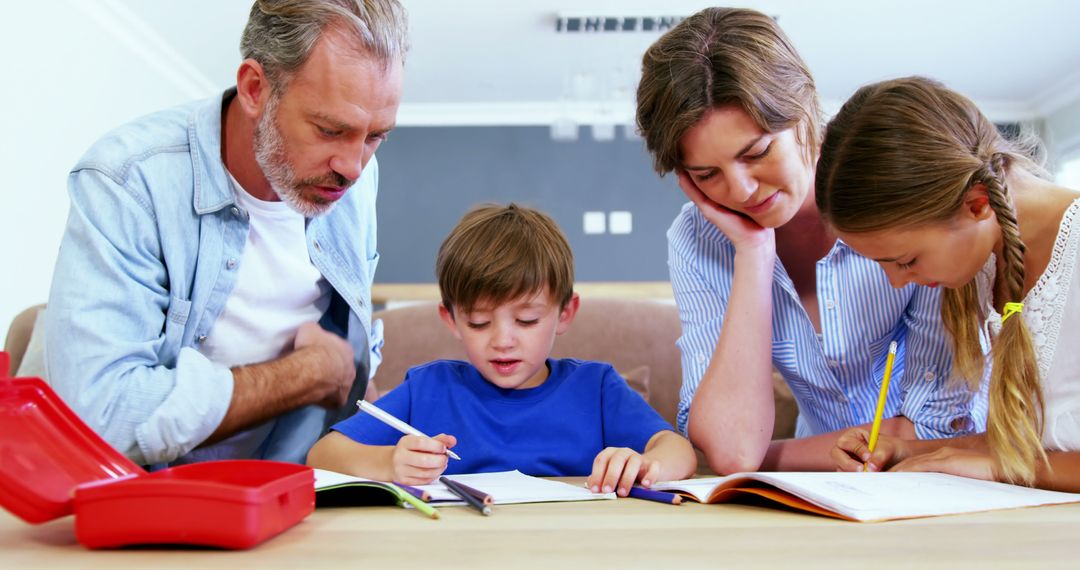 Family Studying Together at Home During Distance Learning - Free Images, Stock Photos and Pictures on Pikwizard.com