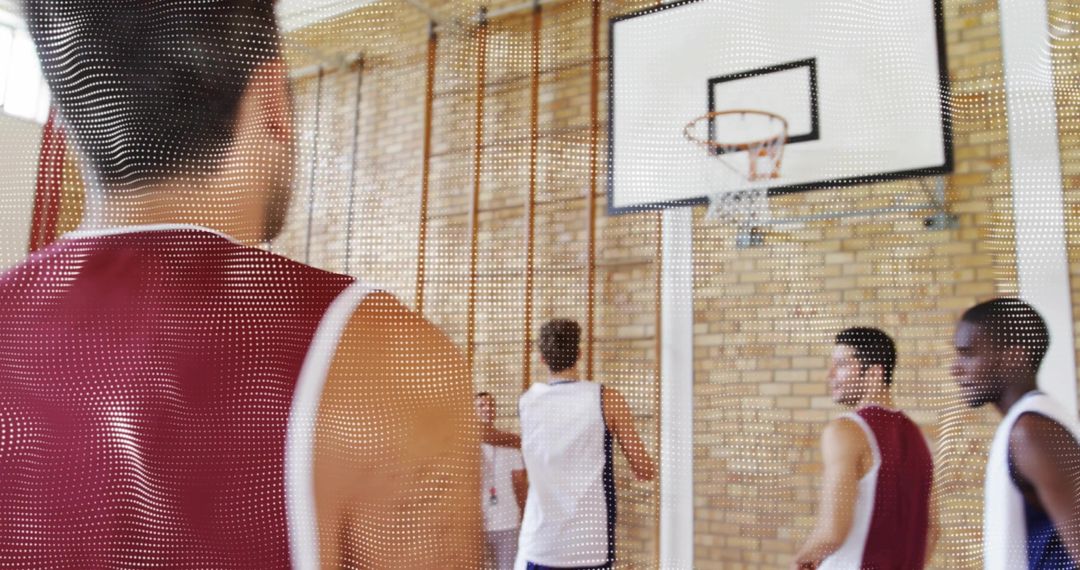 Youth Basketball Practice in Gym with Red Jersey Focus