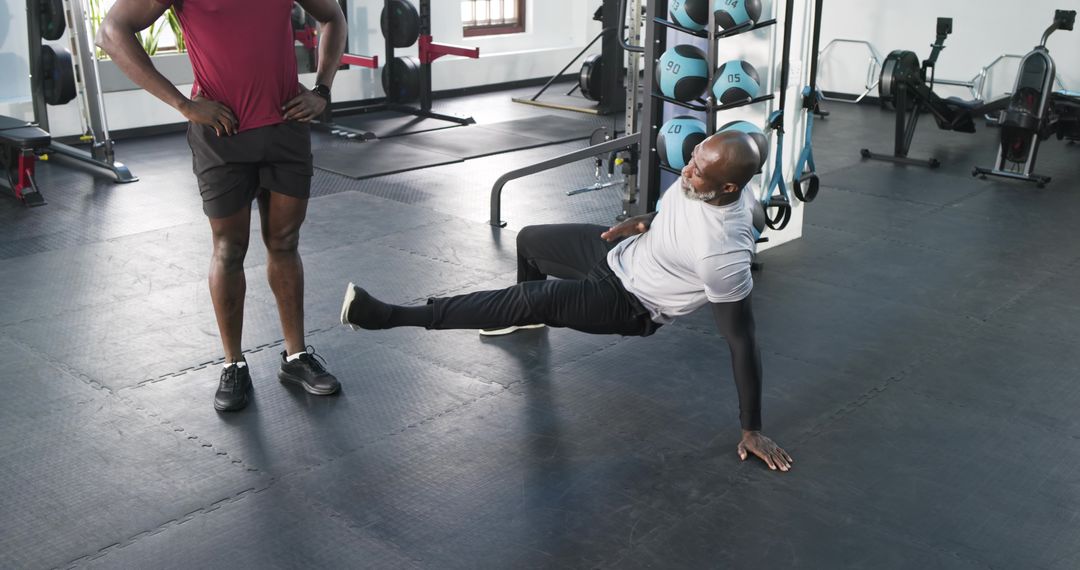 Personal Trainer Motivating Client During Strength Training Session