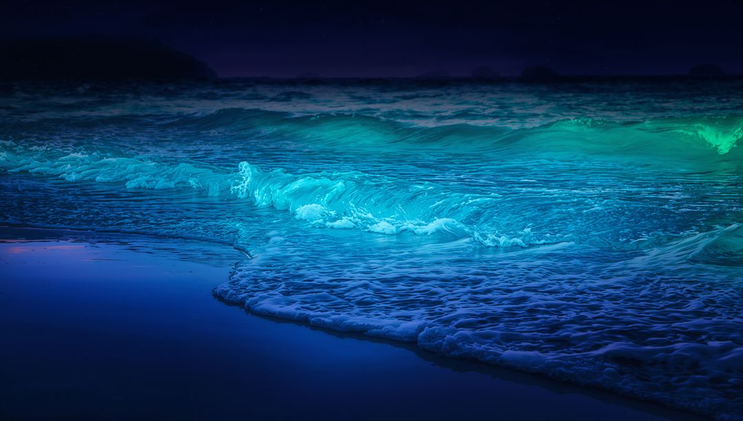 Glowing bioluminescent waves breaking on shore at night with teal and cyan luminous surf