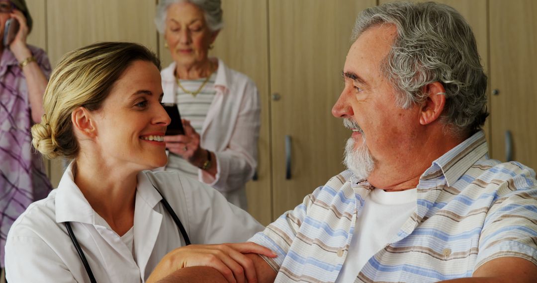 Doctor Comforting Senior Patient in Medical Office - Free Images, Stock Photos and Pictures on Pikwizard.com