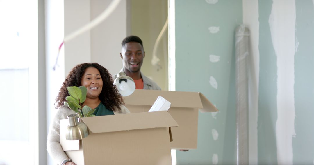 Diverse Team Moving Into a New Modern Office Space