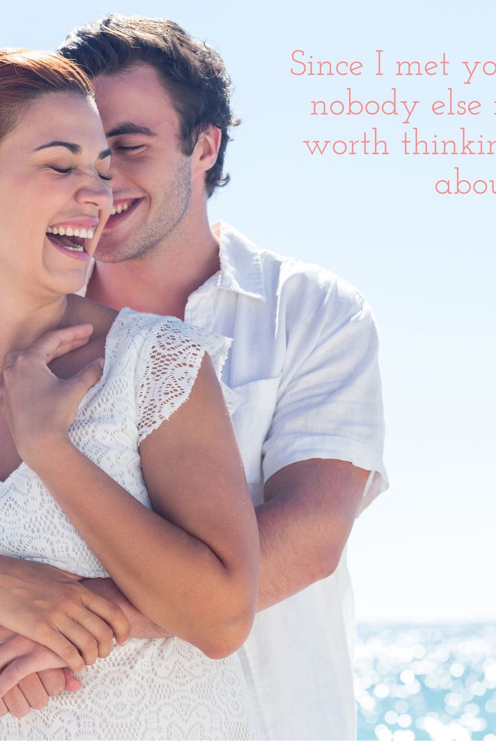 Joyful Couple Embracing by Sea Radiating Love