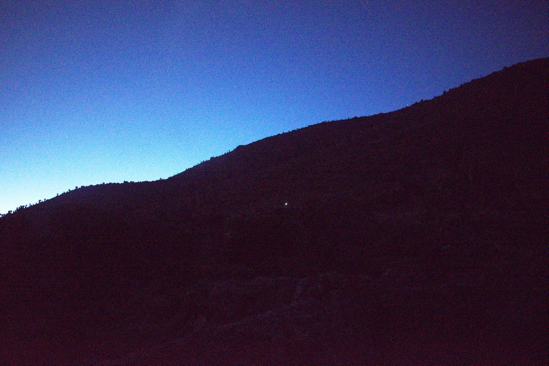 Dark Hill Silhouette Against Evening Sky with Lone Bright Star - Free Images, Stock Photos and Pictures on Pikwizard.com