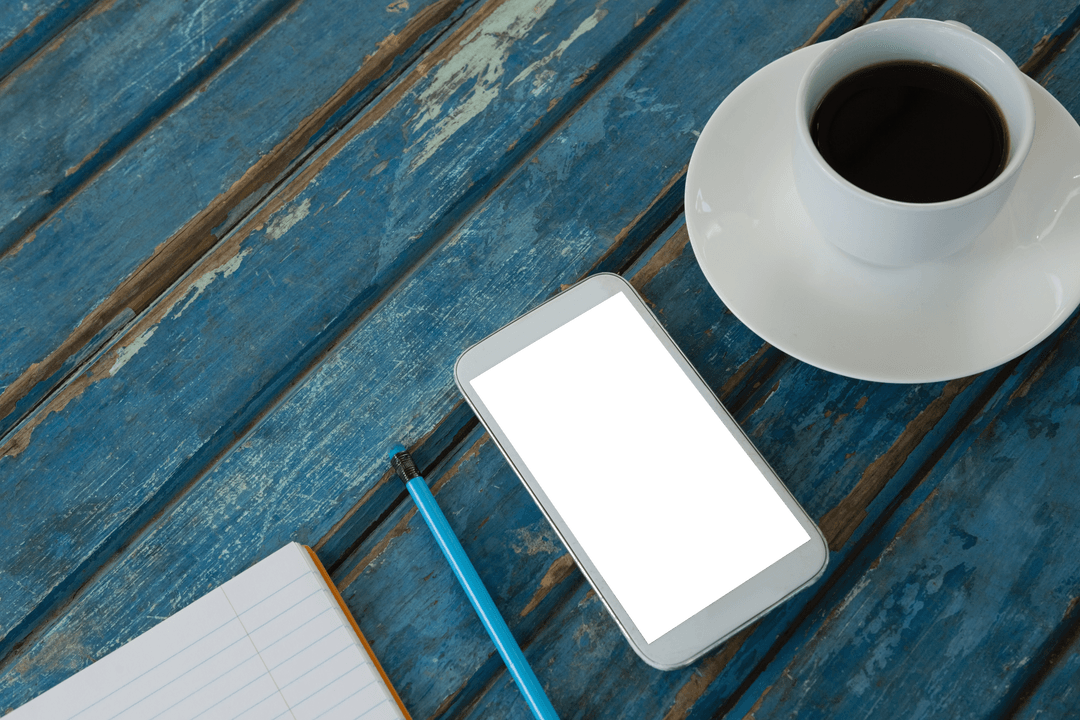 Transparent Smartphone, Coffee Cup, Notepad on Rustic Blue Table