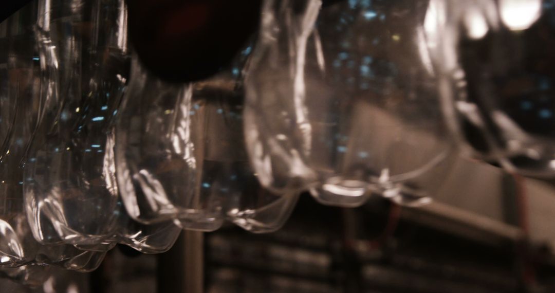 Close-up of Transparent Plastic Bottles on Assembly Line - Free Images, Stock Photos and Pictures on Pikwizard.com