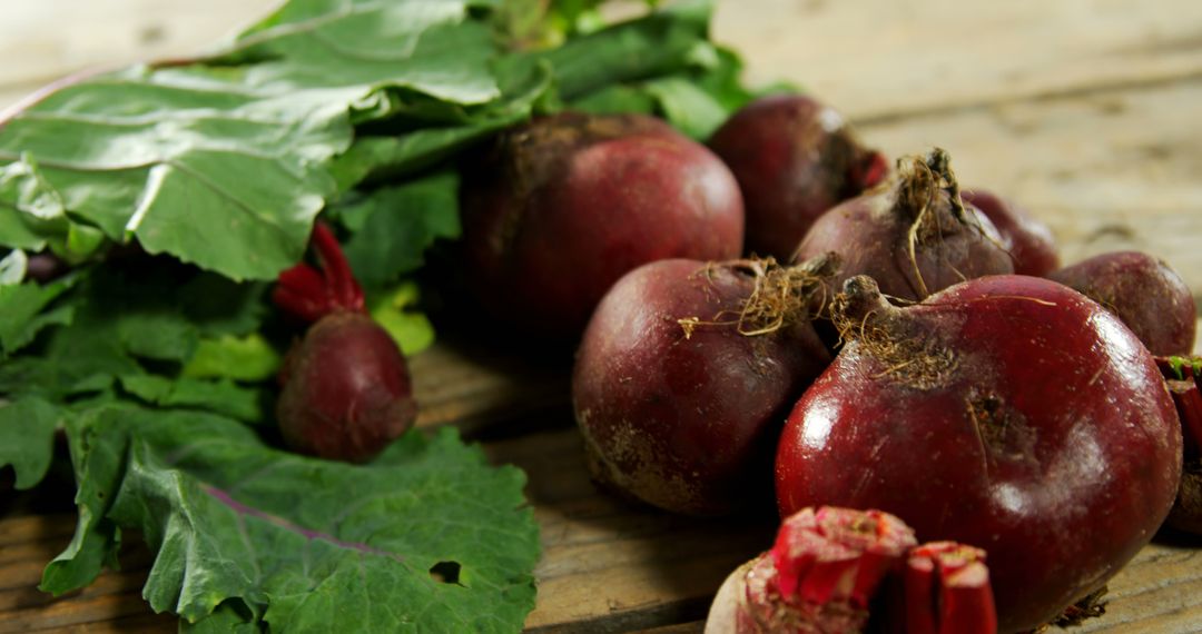 Fresh Beetroots with Leaves on Rustic Wooden Table - Free Images, Stock Photos and Pictures on Pikwizard.com