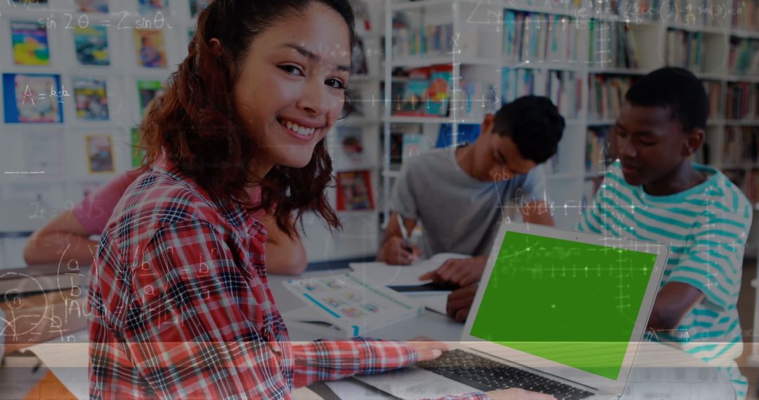 Diverse Students Studying with Laptop in Library Learning Environment