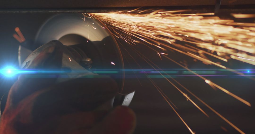 Close-Up of Grinding Wheel Producing Sparks in Workshop