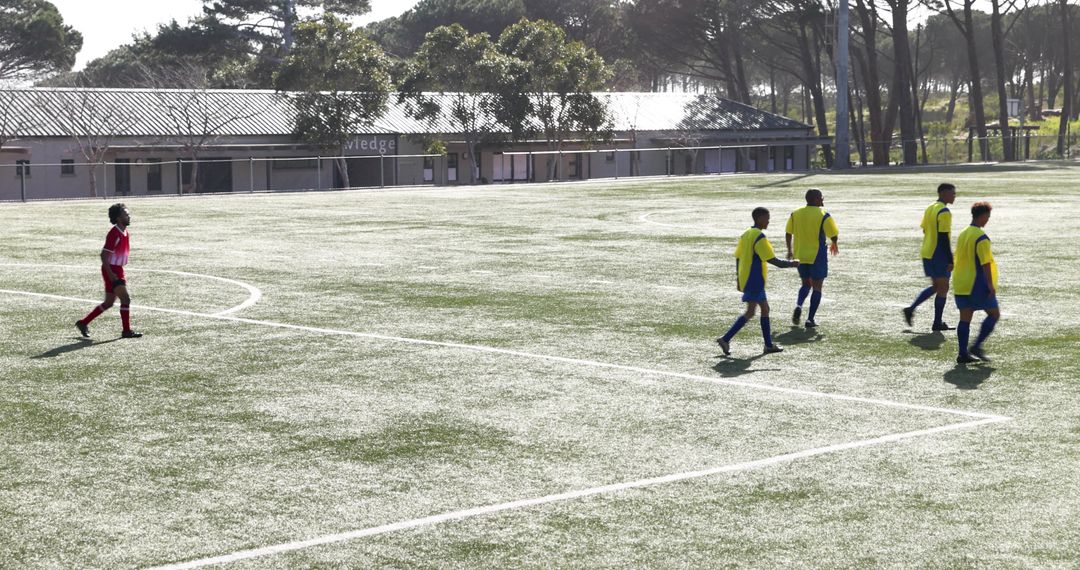 Youth Soccer Players Setting up Free Kick