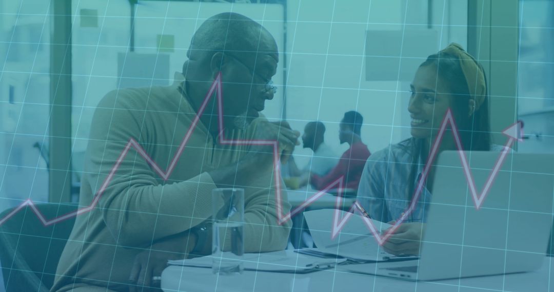 Diverse Colleagues Collaborating on Financial Data Analysis