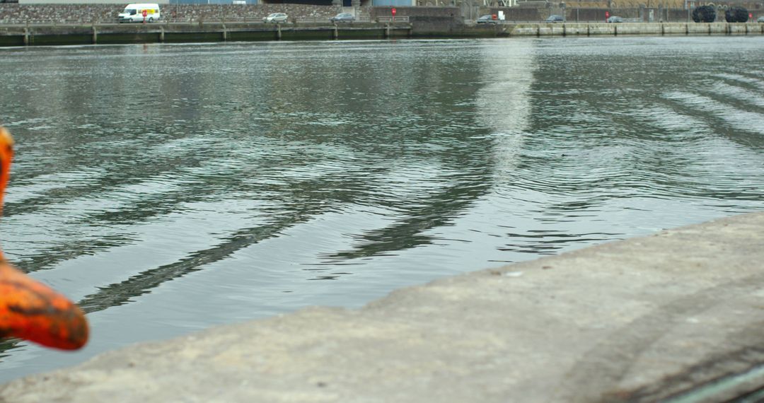 Calm Industrial Waterfront Scene with Reflective Water - Free Images, Stock Photos and Pictures on Pikwizard.com