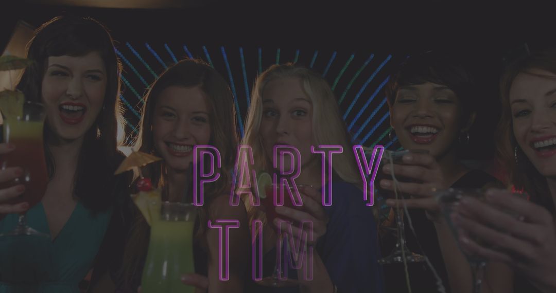 Smiling Group of Women Toasting With Cocktails at Party