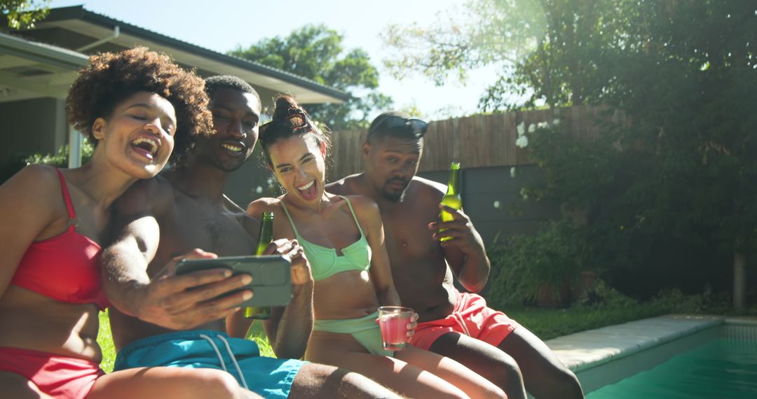 Diverse Friends Taking Selfie by Poolside with Drinks in Hand