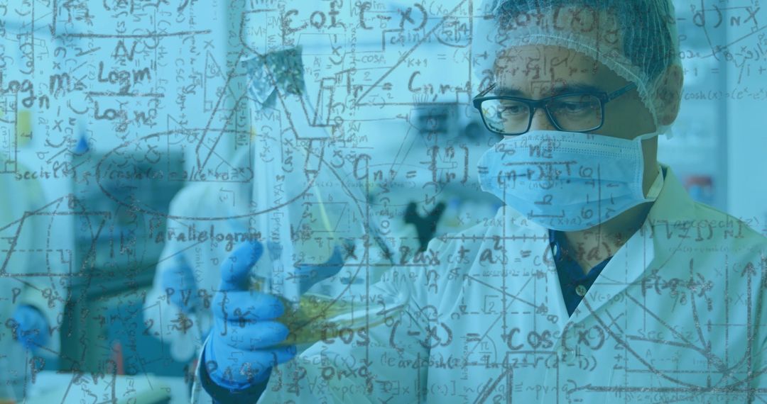 Scientists Conducting Experiments with Overlay of Formulas - Free Images, Stock Photos and Pictures on Pikwizard.com