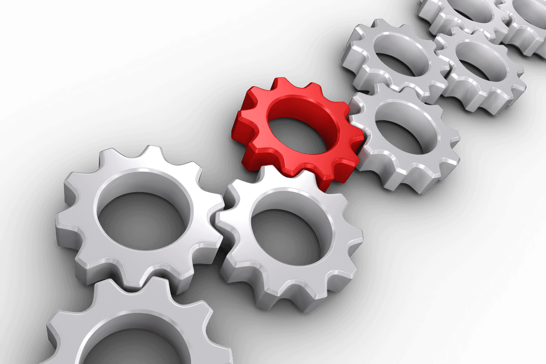 Transparent Red Cog Highlight Among White Gears on Black Background