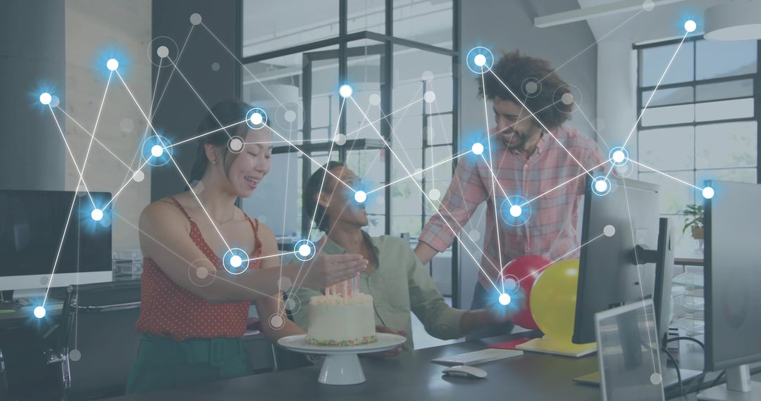 Office team celebrating birthday around desk with cake and glowing digital network overlay