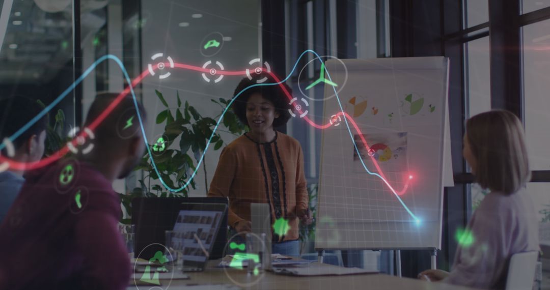 Diverse Team Analyzing Eco-Friendly Business Strategies and Data