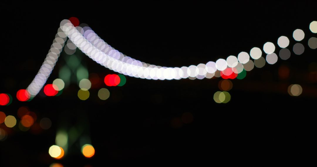 Abstract Bokeh Lights of Suspension Bridge at Night