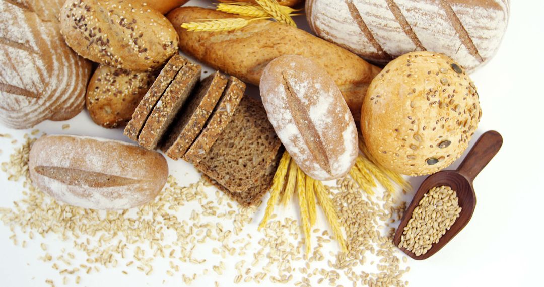 Assortment of Fresh Artisan Bread with Wheat and Grains - Free Images, Stock Photos and Pictures on Pikwizard.com