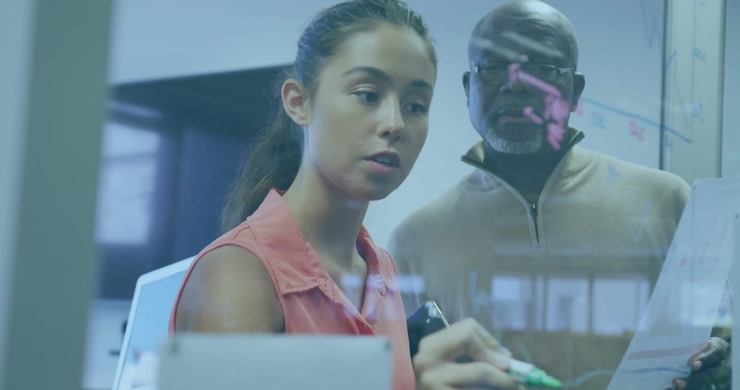 Collaborative Office Brainstorming on Glass Board