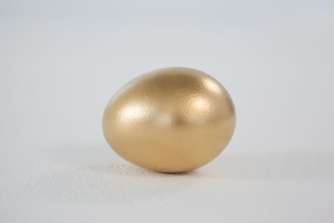 Close Up of Golden Easter Egg on White Background - Free Images, Stock Photos and Pictures on Pikwizard.com