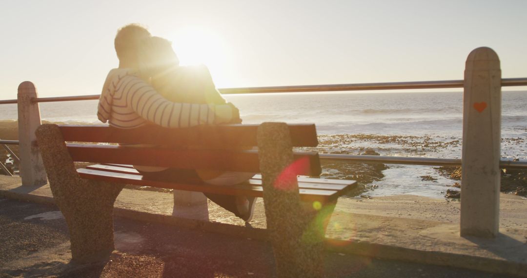 Couple Enjoying Romantic Sunset by Beach - Free Images, Stock Photos and Pictures on Pikwizard.com