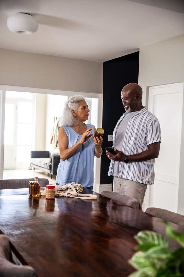 Diverse Couple Shopping Experience in Modern Home
