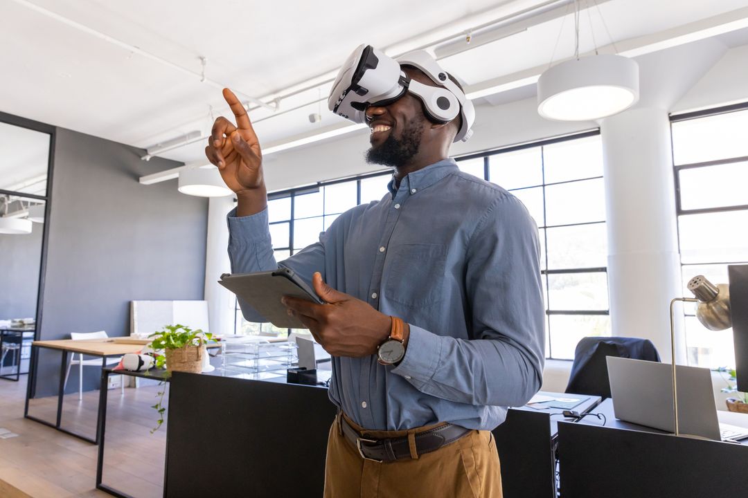 African American Man Using VR Headset in Modern Office Space
