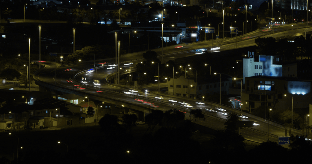 Transparent Night Cityscape with Blurred Traffic Lights and Highways