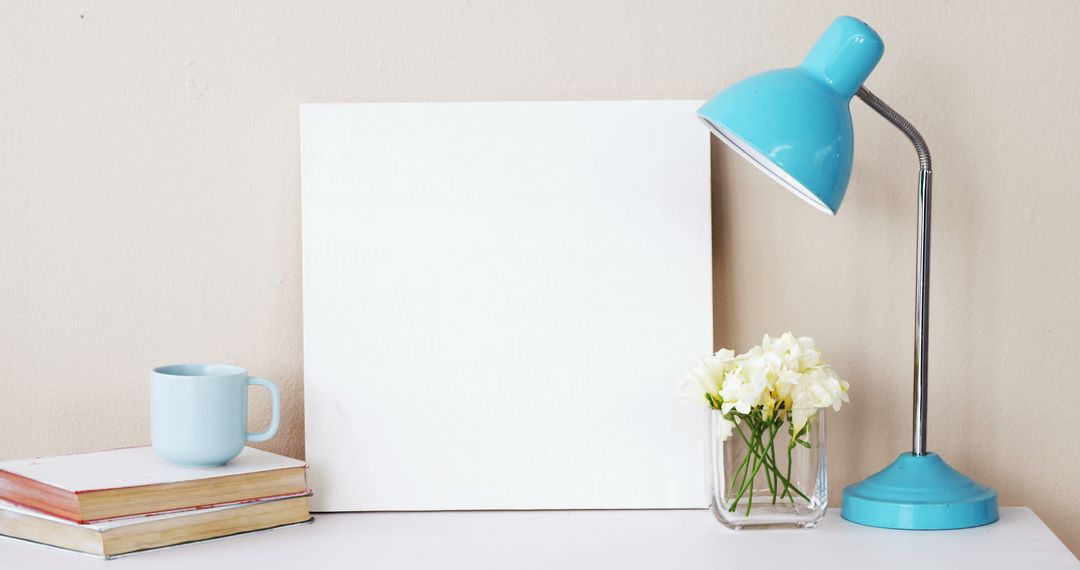 White Canvas with Blue Lamp and Decorative Items on White Desk - Free Images, Stock Photos and Pictures on Pikwizard.com