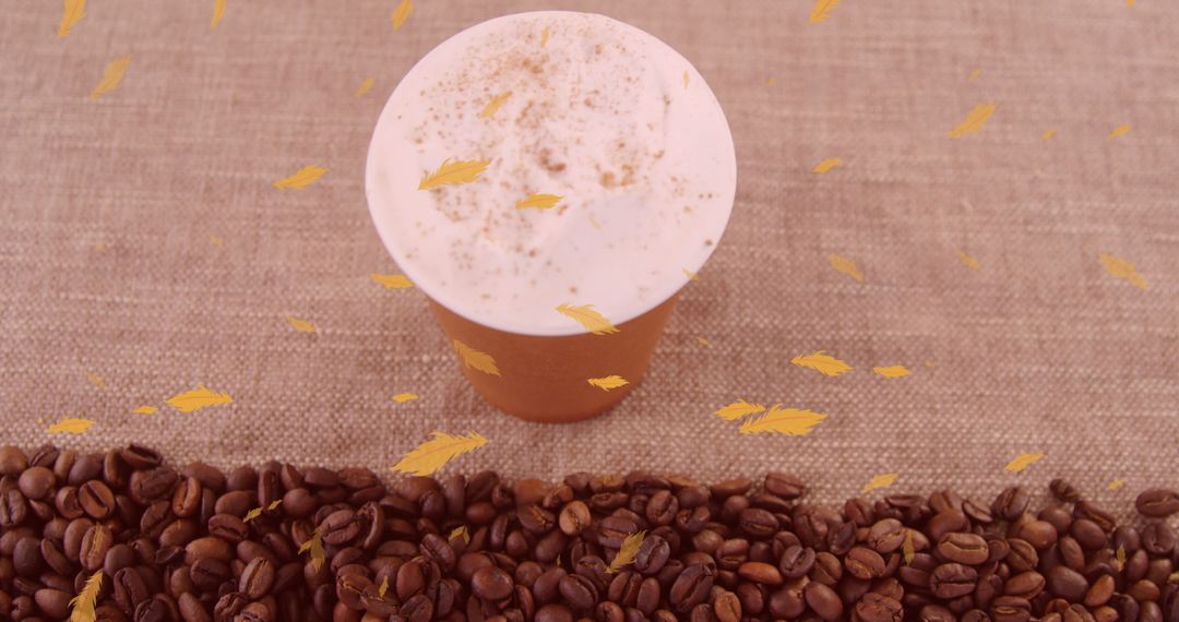 Rustic Coffee Cup with Autumn Leaves on Burlap