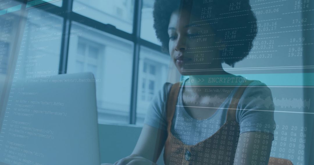 Focused Professional Woman Writing Code on Laptop in Modern Workspace