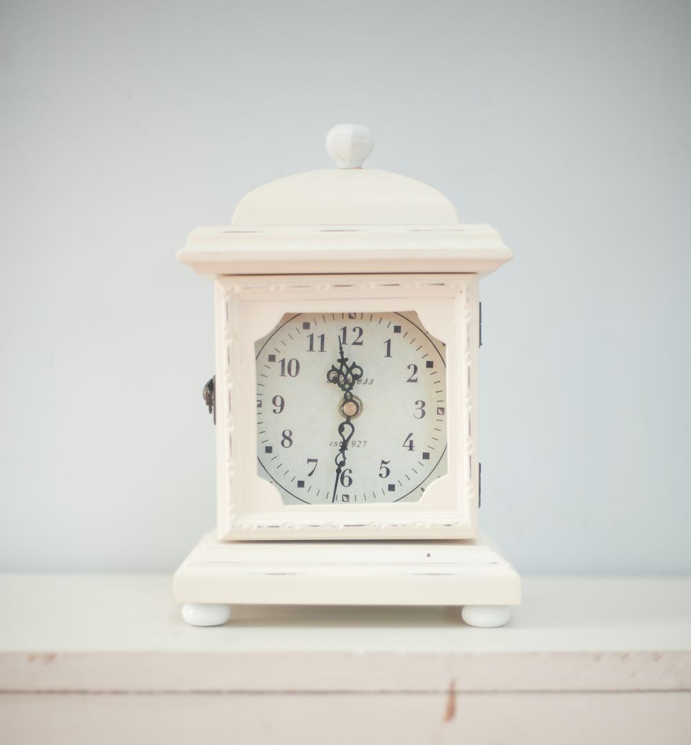 Vintage White Table Clock with Intricate Design - Free Images, Stock Photos and Pictures on Pikwizard.com