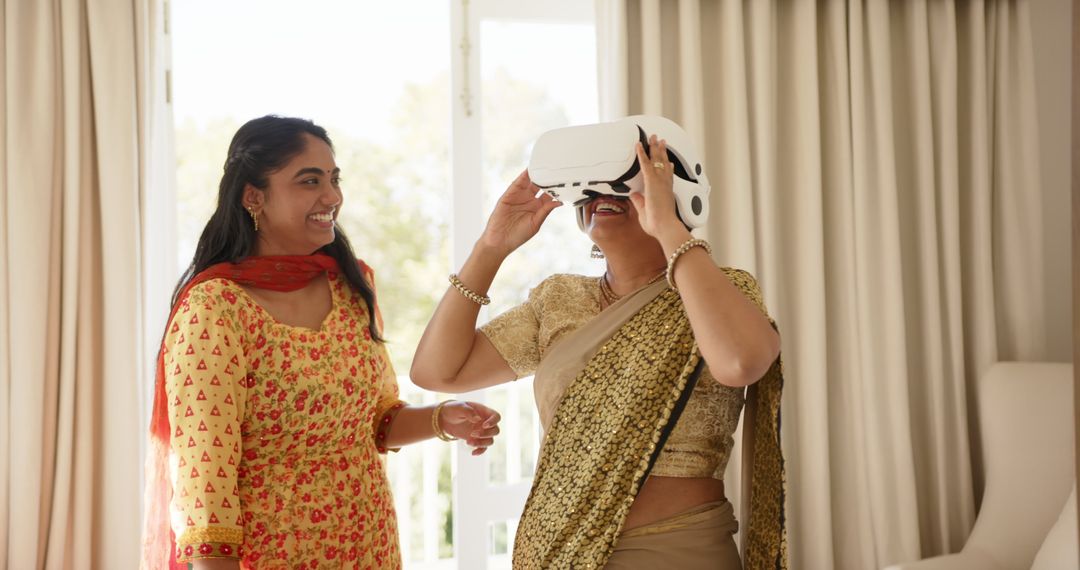 Indian Mother and Daughter Enjoying Virtual Reality Experience