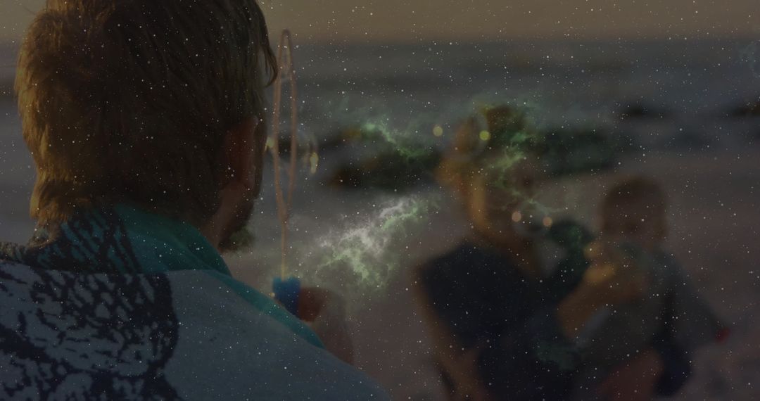 Man with Baby Enjoying Romantic Beach at Sunset