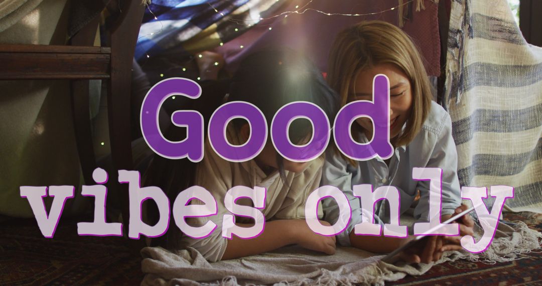 Good Vibes Only Text Over Mother and Daughter in Blanket Fort