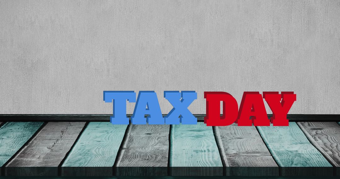 Tax Day Concept with Colorful Block Letters on Wooden Floor