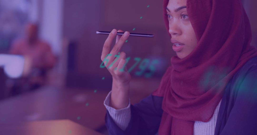 Woman in Hijab Using Smartphone for Secure Transactions