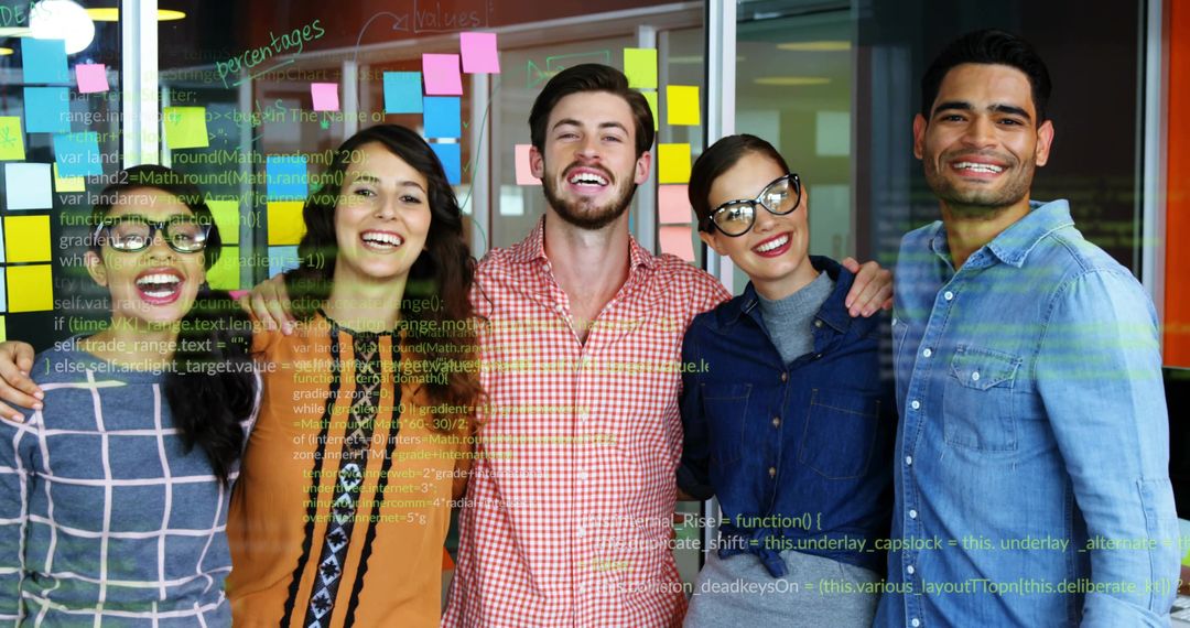 Celebrate Coding Success with Young Diverse Tech Team in Office