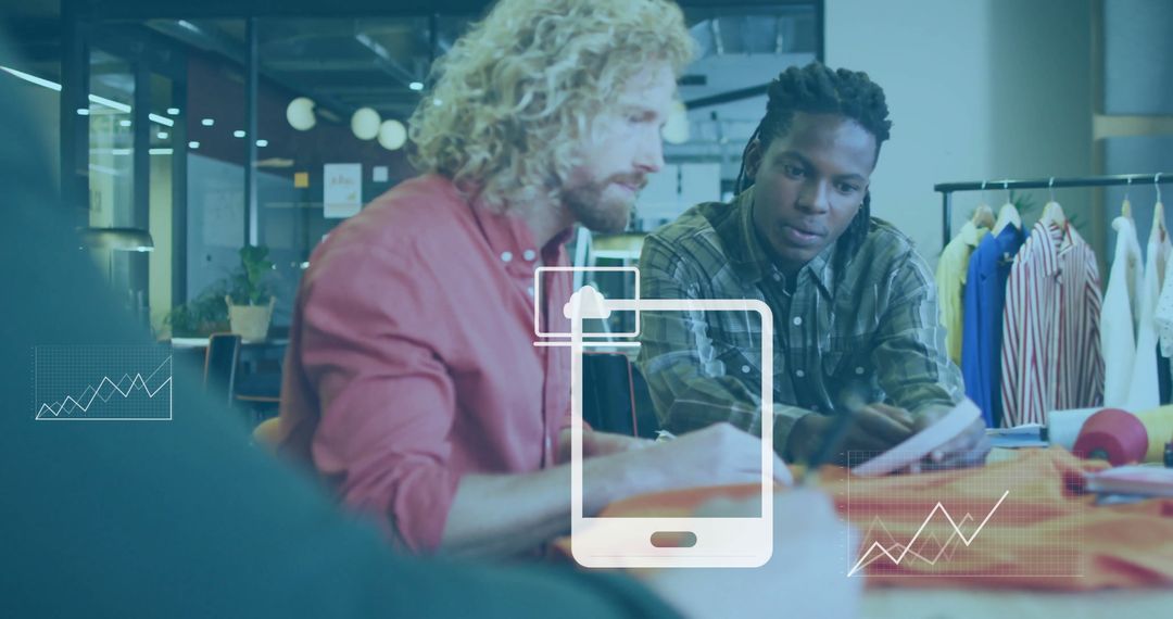 Colleagues Collaborating with Data Analysis in Modern Office