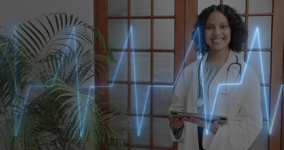 Smiling Female Doctor Holding Tablet in Modern Medical Office with ECG Waveform Overlay - Free Images, Stock Photos and Pictures on Pikwizard.com