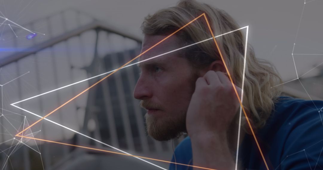 Man with Earphones Among Neon Geometry and Networks