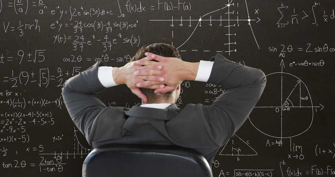 Man Seated Backwards Pondering Complex Mathematical Equations